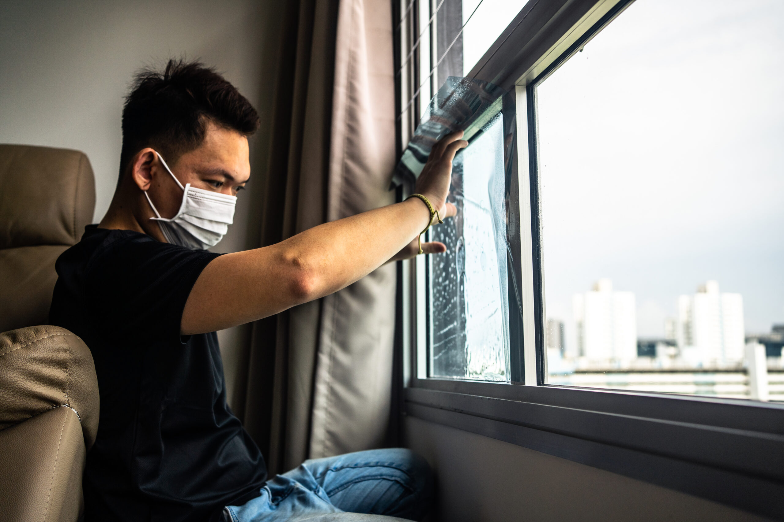 Surfexa team installing Ultraviolet window film & UV light & ray protection film in Singapore BTO & HDB