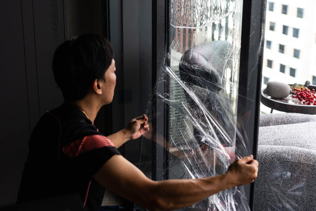 Surfexa team installing Ultraviolet window film & UV light & ray protection film in Singapore BTO & HDB