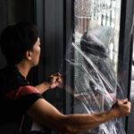 Surfexa team installing Ultraviolet window film & UV light & ray protection film in Singapore BTO & HDB