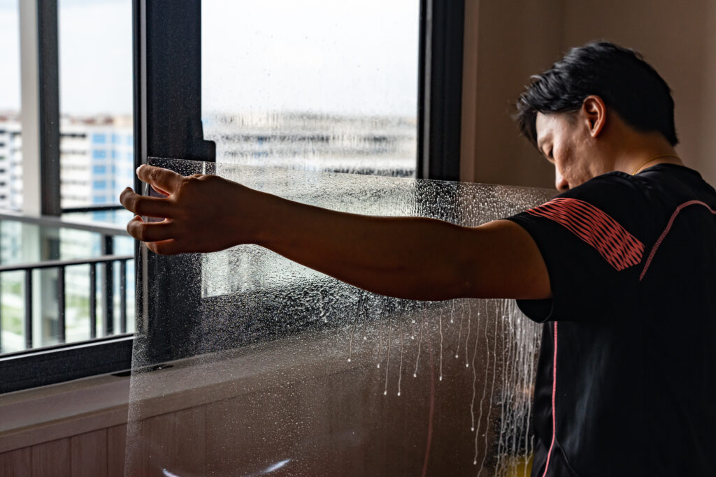 Surfexa installing glass safety film in homes